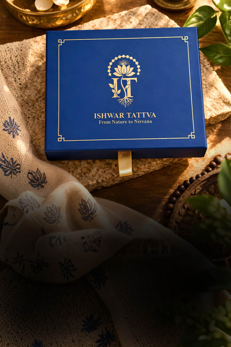 A mala packed in the Ishwar Tattva royal blue gift box